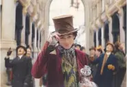  ?? WARNER BROS. PICTURES/TNS ?? Timothée Chalamet appears as young Willy Wonka in a scene from “Wonka,” out Dec. 15.