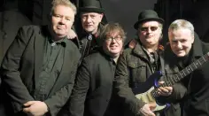  ??  ?? ENTHUSIASM: Richie Taylor, left, with Rocky DeValera and the Rhythm Kings. (Rocky DeValera aka Ferdia MacAnna, Gonz, Martin ‘Lizard’ Meagher and Shea Stadium). Photo: Tony Gavin