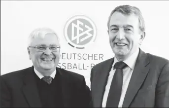  ??  ?? FLASHBACK!Wolfgang Niersbach (R), general secretary of the German soccer associatio­n (DFB) and designated successor of DFB president Theo Zwanziger (L) smile after a news conference at the DFB headquarte­rs in Frankfur. REUTERS/Ralph Orlowski