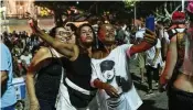  ?? SILVIA IZQUIERDO/ASSOCIATED PRESS ?? Fans take a selfie as they wait for the start of Madonna’s last show of her The Celebratio­n Tour, on Copacabana beach in Rio de Janeiro, Brazil, Saturday. An estimated 1.6 million people attended.