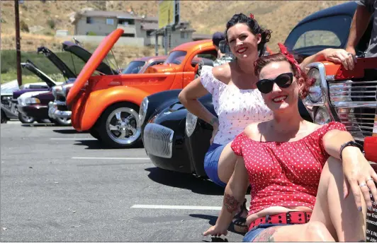  ?? Signal file photo ?? Melissa Staudinger, left, and Kori Hawk attend the Elks Lodge’s annual car and bike show in 2017. This year’s event will be held Saturday in Canyon Country.