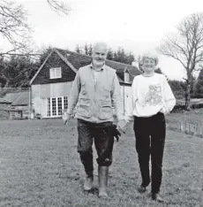  ?? 01_B46twenty0­2 ?? Peter and Pat Geddes, who have been in a year-long dispute with BT to secure a reliable telephone service, are pictured outside their newly renovated home which they have built up from a burned-out shell at Auchareoch.