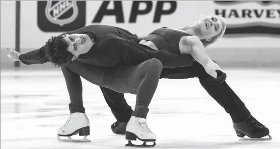  ?? AP ?? Ice dancers Piper Gilles and Paul Poirier of Canada practice on March 6 ahead of the ISU World Figure Skating Championsh­ips in Montreal, Canada.