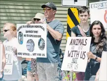  ?? LUKE EDWARDS METROLAND ?? Members of At War for Animals Niagara say they’re fighting against speciesism, assigning different values or giving special treatment to a being based solely on what species they are.