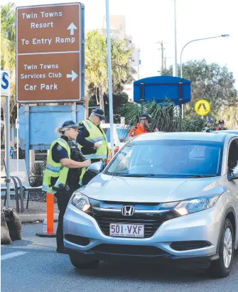  ?? Picture: SCOTT POWICK ?? Border checkpoint­s dividing Coolangatt­a-Tweed residents have worn thin.