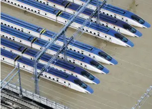  ??  ?? A Shinkansen bullet train rail yard is seen flooded due to heavy rains caused by Typhoon Hagibis in Nagano, central Japan, on October 13.