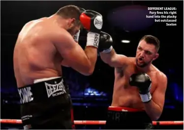  ?? Photo: ACTION IMAGES/LEE SMITH ?? DIFFERENT LEAGUE: Fury res his right hand into the plucky but outclassed Sexton