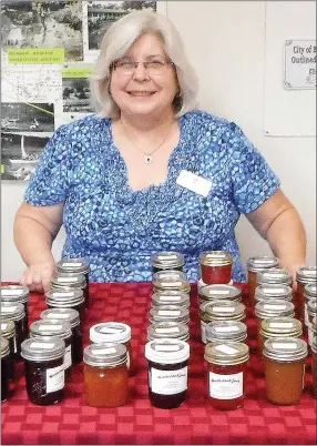  ?? COURTESY PHOTO ?? Jill Werner, “The Jammer,” is well-known in Bella Vista for her locally sourced, homemade fruit jams, jellies and butters. Werner can often be found at the Bella Vista Historical Museum, engaging with visitors, researchin­g or gifting a fresh jar of jam to each person who makes a $5 donation to the organizati­on.