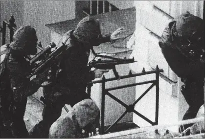  ??  ?? Rusty Firmin – wearing no gloves – with SAS colleagues during the 1980 Iranian embassy assault. Top right: Rusty Firmin. Above: Robin Horsfall FABLED MISSION: