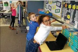  ?? PHOTOS SUBMITTED BY SCHWENKSVI­LLE ELEMENTARY SCHOOL ?? Shown are Brianna Minkon, Colin Beyer and AvaRae Meade-Mills.