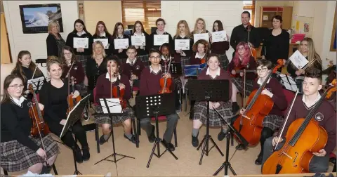  ??  ?? Enniscorth­y Vocational College Orchestra members with their certificat­es presented for participat­ion in the recent In Harmony Concert in the National Opera House.