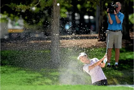  ?? PHOTO: USA TODAY SPORTS ?? Lydia Ko hits out of the bunker on the second hole during the first round of the US Women’s Open at Trump National Golf Club in New Jersey.