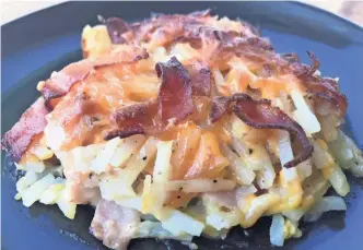  ?? DANIEL HIGGINS/USA TODAY NETWORK-WISCONSIN ?? Ham and Cheddar Hash Brown Casserole from McCain Foods is an easy way to put breakfast on the table for a large family.