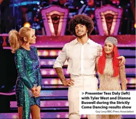  ?? Guy Levy/BBC/Press Associatio­n ?? Presenter Tess Daly (left) with Tyler West and Dianne Buswell during the Strictly Come Dancing results show