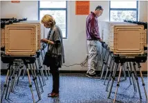  ?? JOHN SPINK/JSPINK@AJC.COM ?? Voters in several metro Atlanta cities will cast votes today in races that had either too large a pool of candidates Nov. 5 or, in one case, candidates with the same number of votes.