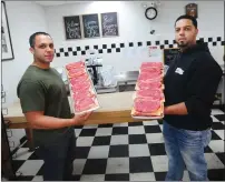  ?? Ernest A. Brown photo ?? Jean Carlo Vazquez, left, and his brother Emanuel, are the new owners of Butcher Brothers Meat Market, formerly Shaw’s Meats, on North Main Street in Woonsocket.