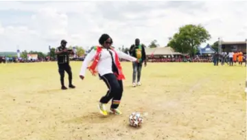  ?? ?? GETTING THE BALL ROLLING . . . Informatio­n, Publicity and Broadcasti­ng Services Minister Monica Mutsvangwa kicks the ball to officially open the Tinmac Foundation Sports Festival’s finals at St Anne’s Goto in Wedza on Saturday