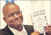  ?? AP ?? Paul Beatty poses with his book The Sellout after the Man Booker Prize ceremony in London on Tuesday.