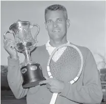  ?? THE ASSOCIATED PRESS ?? Gardnar Mulloy with his hardware after defeating Mike Davies in the men’s singles final of the Sugar Bowl Invitation­al Tennis Tournament in New Orleans in 1959.