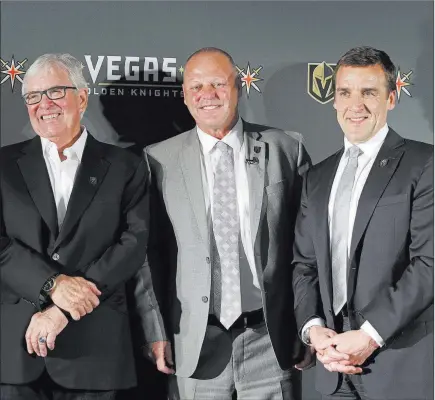  ?? John Locher ?? The Associated Press The Golden Knights’ management team, from left, owner Bill Foley, coach Gerard Gallant and general manager George Mcphee.