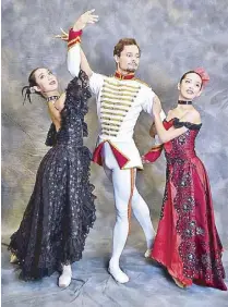  ??  ?? Veronica Atienza, Martin Buczcko and Kim Abrogena perform in Philippine Ballet Theatre’s The Merry Widow.