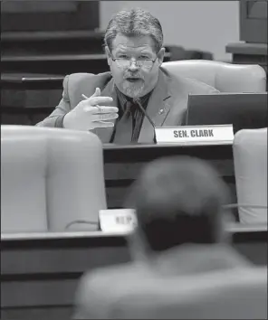  ?? Arkansas Democrat-Gazette/STEPHEN B. THORNTON ?? At a hearing Friday at the state Capitol, Sen. Alan Clark, R-Lonsdale, questions attorney Sam Ledbetter about a proposed ban on medium and large hog farms in the Buffalo National River watershed.