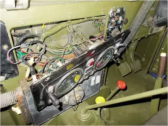  ??  ?? Lightweigh­t dash panel comes out for wiring repairs