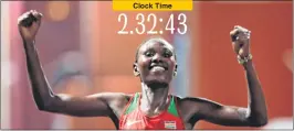  ??  ?? Kenya's Ruth Chepngetic­h celebrates after winning the Women's Marathon at the 2019 IAAF World Athletics Championsh­ips in Doha on Friday.