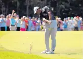  ?? MICHAEL DWYER/ASSOCIATED PRESS ?? Tiger Woods hits from the fairway on the fifth hole during the Dell Technologi­es Championsh­ip on Sunday. He’s six shots behind Abraham Ancer.