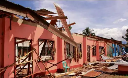  ?? —RICHEL V. UMEL ?? The impact of the Maute group on communitie­s that are caught in the crossfire is most visible in Butig, Lanao del Sur, where this high school building was left barely standing when the armed forces launched air strikes on the terrorists in December last year.