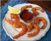  ?? PHOTO BY EMILY RYAN ?? Fried shrimp are always popular.