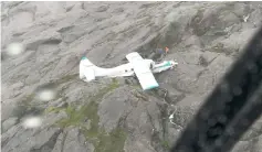  ??  ?? This handout photo shows a float plane that crashed on a mountainsi­de in Alaska. — AFP photo