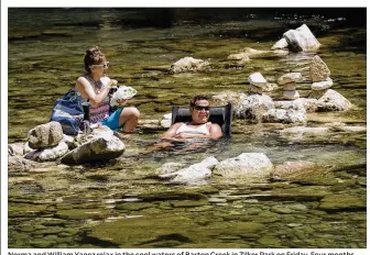  ?? JAY JANNER / AMERICAN-STATESMAN ?? Norma and William Yanez relax in the cool waters of Barton Creek in Zilker Park on Friday. Four months into 2017, Camp Mabry has recorded its warmest-ever start to a year.