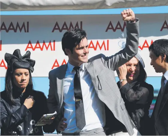  ?? Picture: AAP IMAGE ?? Trainer James Cummings (centre) will add to his family’s strong racing name after taking up a role with the powerful Godolphin stable.