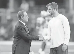  ??  ?? Al Michaels talks with Cardinals quarterbac­k Josh Rosen before the game against the Cowboys at AT&amp;T Stadium on Aug. 26. TIM HEITMAN/USA TODAY SPORTS