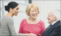  ?? PICTURES: PA WIRE. ?? CHINNING WAYS: Top, A boy strokes the Duke of Sussex’s beard, at Croke Park; above, the Duchess of Sussex greets President Michael D Higgins and Sabina Higgins, at Aras an Uactharain.