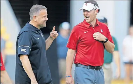  ??  ?? Baylor's Matt Rhule, left, and Oklahoma'a Lincoln Riley coach the Big 12's top two teams and could both be the target of numerous NFL coaching searches in the future. [AP PHOTO/LM OTERO]