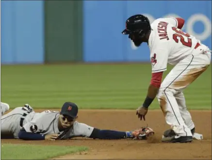  ?? TONY DEJAK — THE ASSOCIATED PRESS ?? The Tigers’ Jose Iglesias can’t reach second base as the Indians’ Austin Jackson is safe on a force play in the seventh inning.