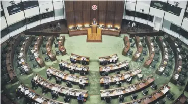  ??  ?? 0 The main chamber of the Legislativ­e Council in Hong Kong