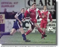  ??  ?? Kiddermins­ter’s Stewart Hadley fires in a cross against Carlisle in the FA Cup 2nd round, in 2000