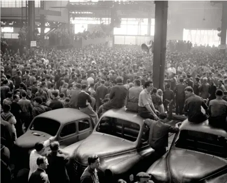  ?? AFP ?? Workers attend the general assembly of strikers in a workshop of the former Renault factory on the Ile Seguin near Paris in April 1953.