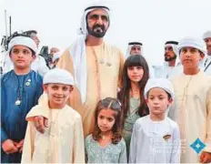  ?? Courtesy: Dubai Media Office ?? ■ Shaikh Mohammad with his son Zayed and grandchild­ren at Meydan.