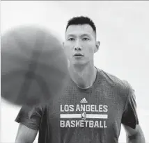  ?? Frderic J. Brown AFP/Getty Images ?? A LOTTERY PICK in 2007, Yi Jianlian has been out of the NBA since 2012, but he might make the Lakers’ roster.