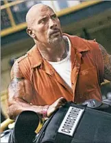  ?? UNIVERSAL PICTURES/AP ?? Dwayne Johnson stars in “The Fate of the Furious,” which raced this weekend toward a box-office record.