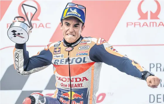  ??  ?? Marc Marquez celebrates on the podium after winning the German Grand Prix last month.