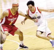  ??  ?? Jeff Chan, right, and Mark Caguioa are now on the same side as teammates at Barangay Ginebra San Miguel. (PBA Images)