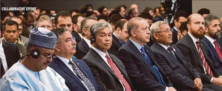  ?? BERNAMA PIC ?? Deputy Prime Minister Datuk Seri Dr Ahmad Zahid Hamidi and Turkish President Recep Tayyip Erdogan (fourth from left) at the Civilisati­ons Forum at Ibn Haldun University in Istanbul.