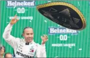  ?? REUTERS ?? Lewis Hamilton during podium celebratio­ns on Sunday.