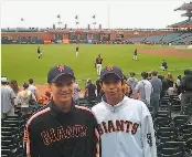  ?? Courtesy Ritchey family ?? Mauricio ( right), attends a Giants game with Ben Ritchey in 2010, at a park where he always dreamed of playing someday. And now he might.