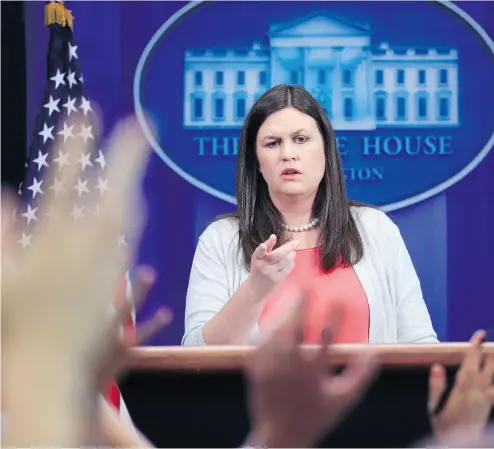  ?? MANUEL BALCE CENETA / THE ASSOCIATED PRESS ?? Less than a week after deputy press secretary Sarah Huckabee Sanders said Donald Trump “in no way form or fashion has ever promoted or encouraged violence,” the president tweeted a video clip of himself body-slamming a CNN logo.